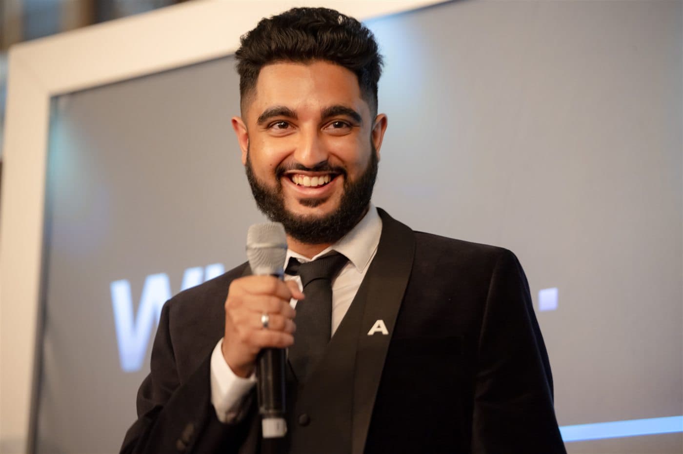 A finalist interviewed on stage at the National Apprenticeship Awards 2023