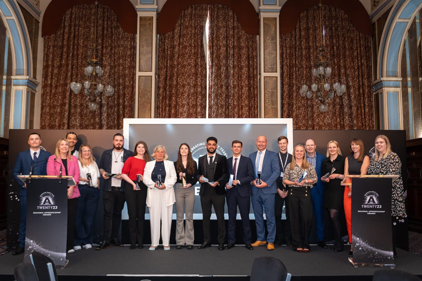 Finalists collecting an award on stage at the National Apprenticeship Awards 2023