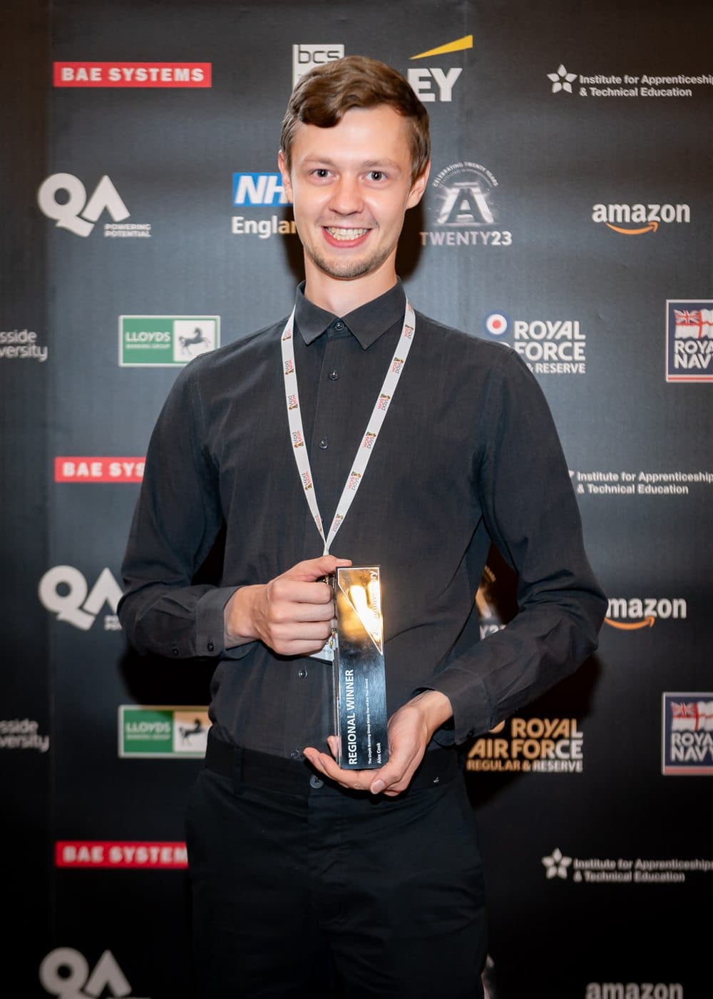 A finalist holding their award at the National Apprenticeship Awards 2023