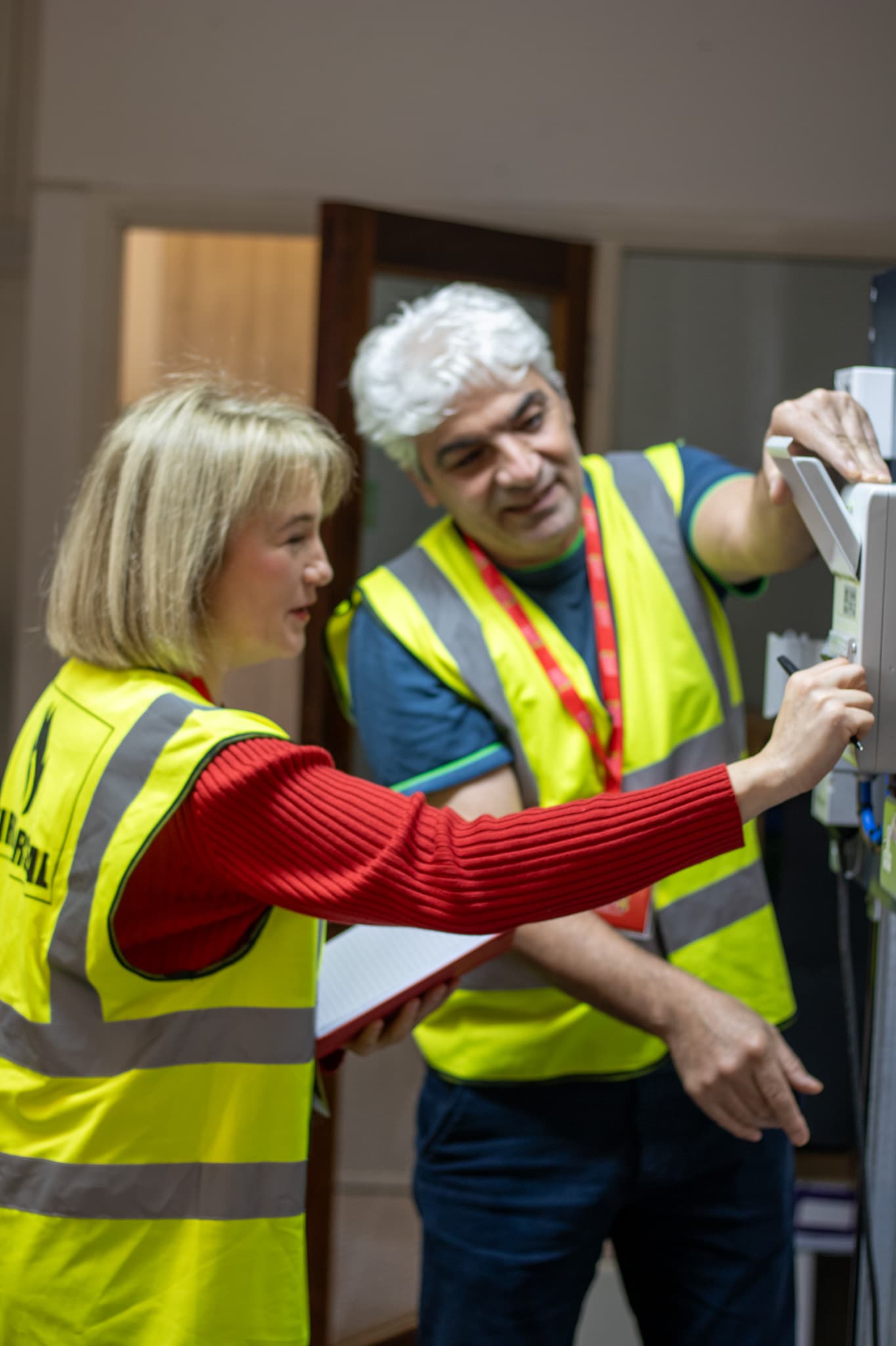Learner pointing out a component on a training board